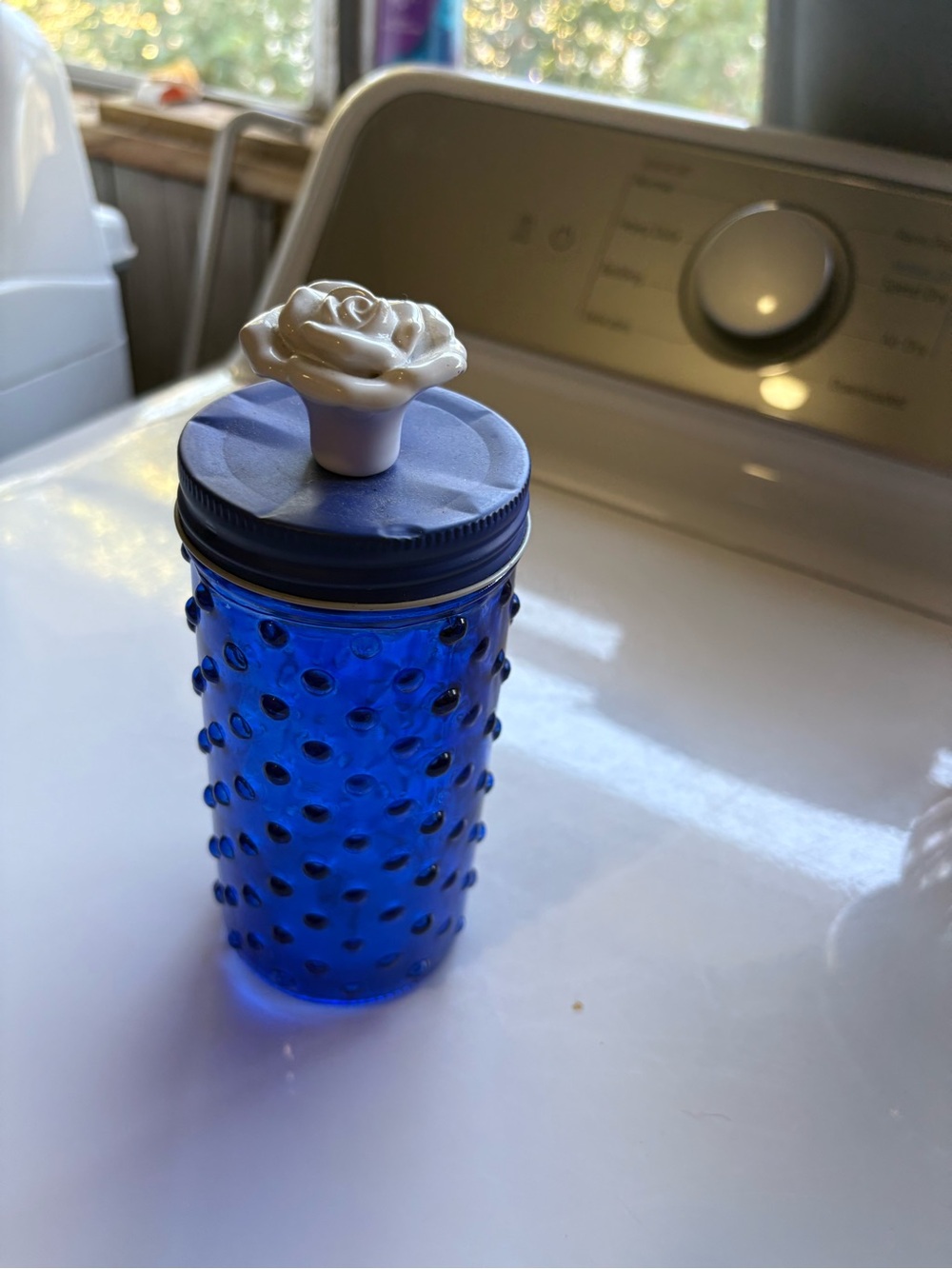 The Pioneer Woman Cobalt Blue Hobnail Glass Jar with White Rose Knob Lid
